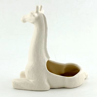 White ceramic giraffe planter