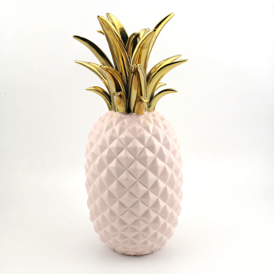 gold pineapple figurine