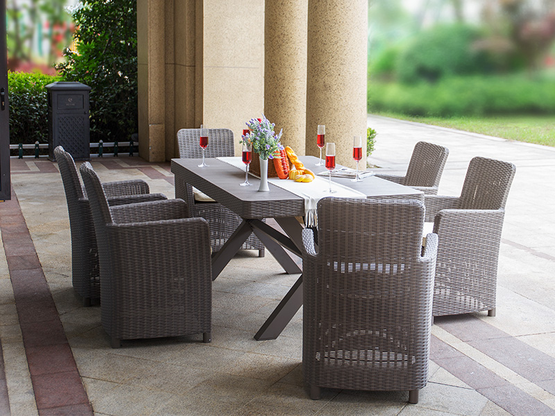 Outdoor plastic dining table and chairs