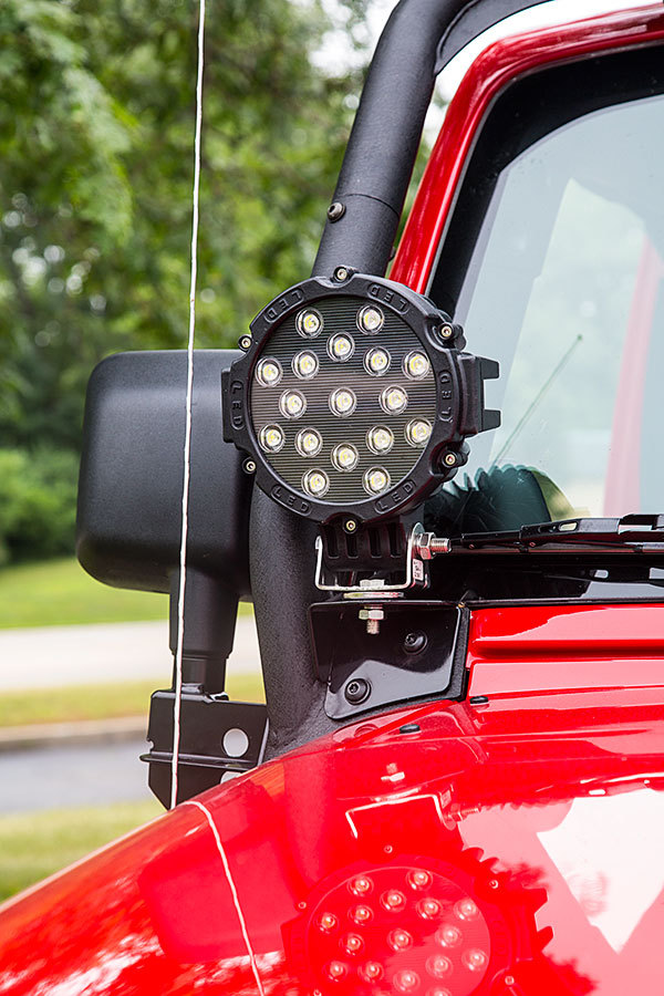 red round truck driving light
