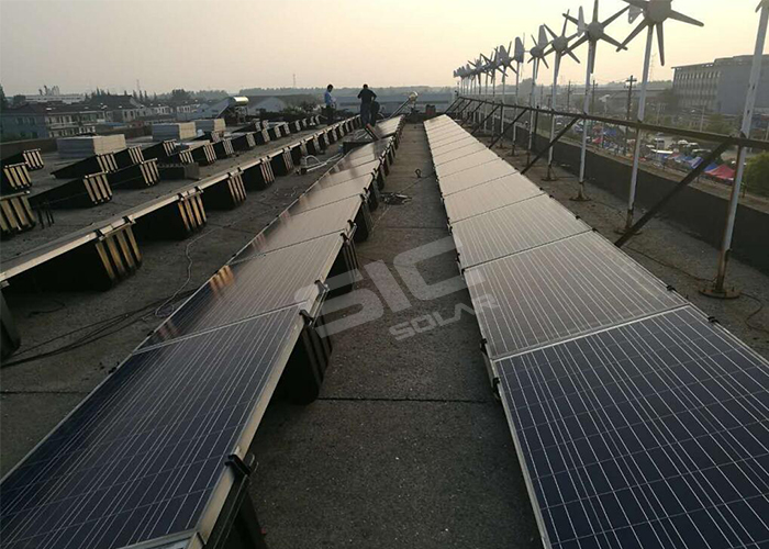 Plastic ballasted solar racking system