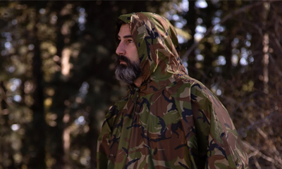 Waterproof woodland camouflage poncho