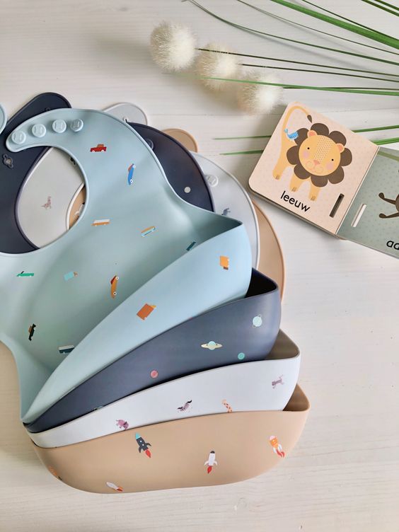 A variety of printed bibs