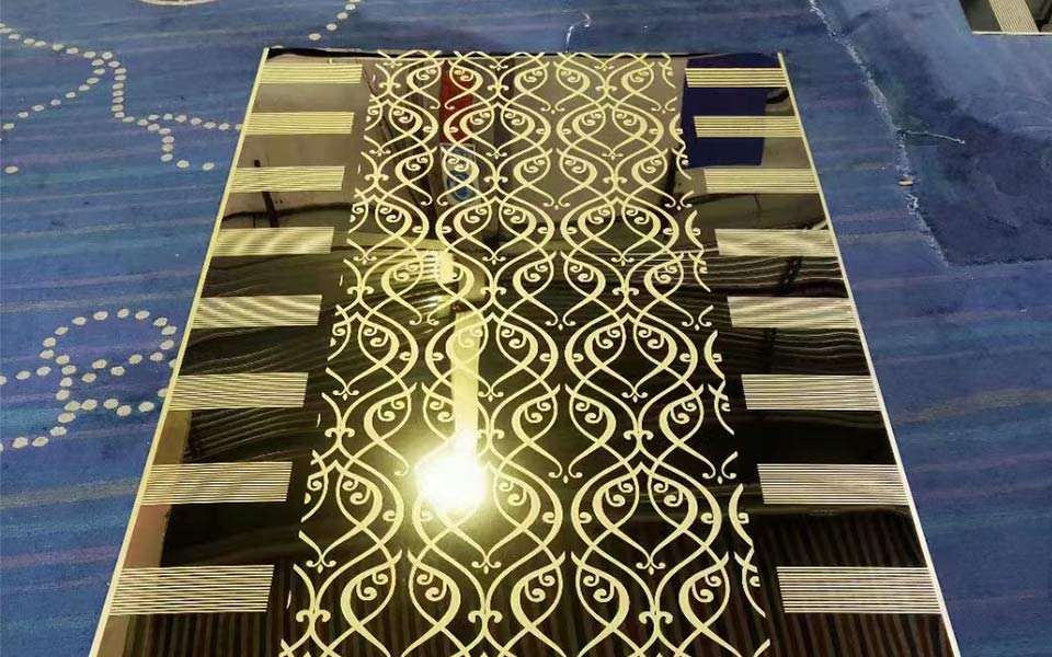 Physical picture of etched gold mirror sheet Etched gold mirror sheet for elevator cab before installation