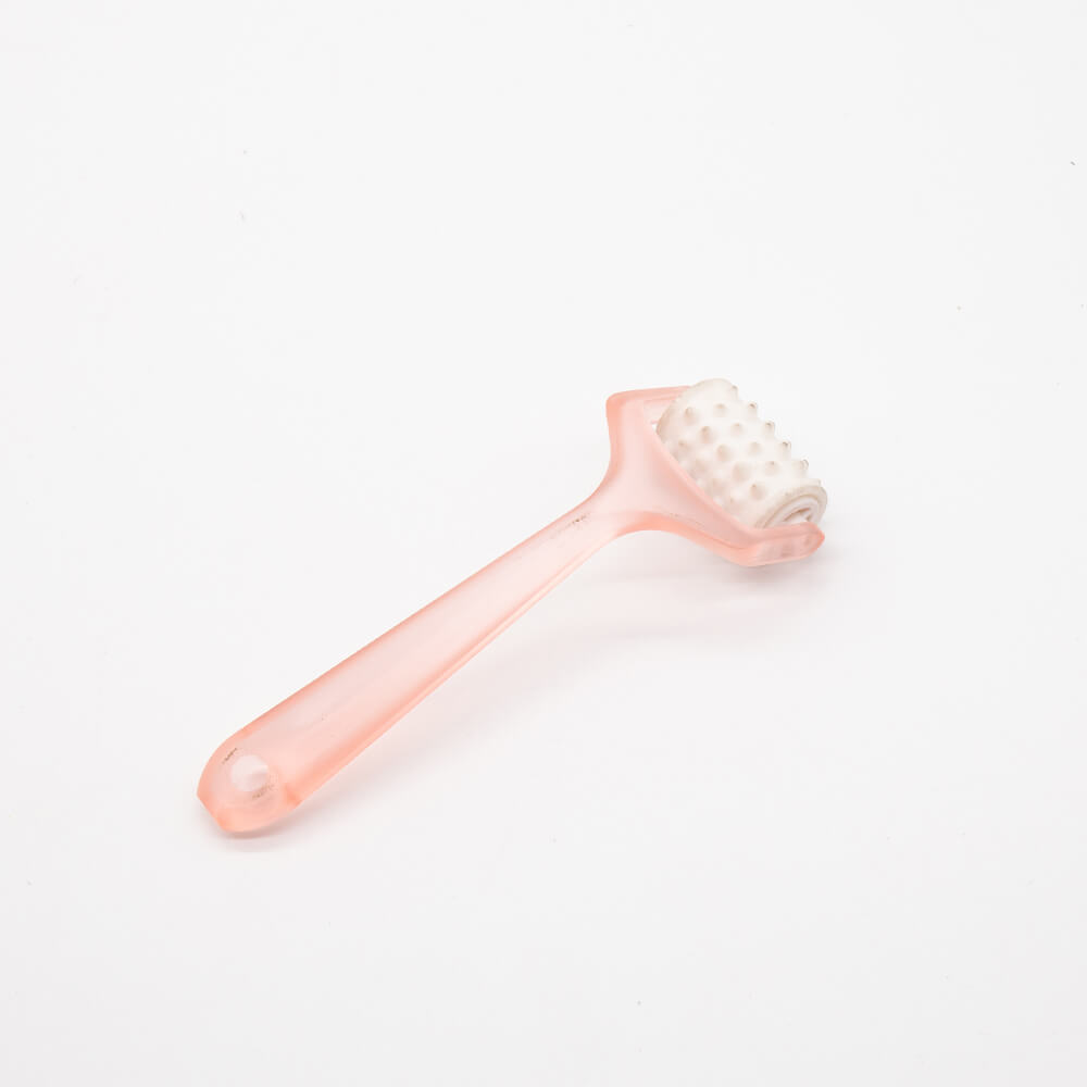plastic face massager