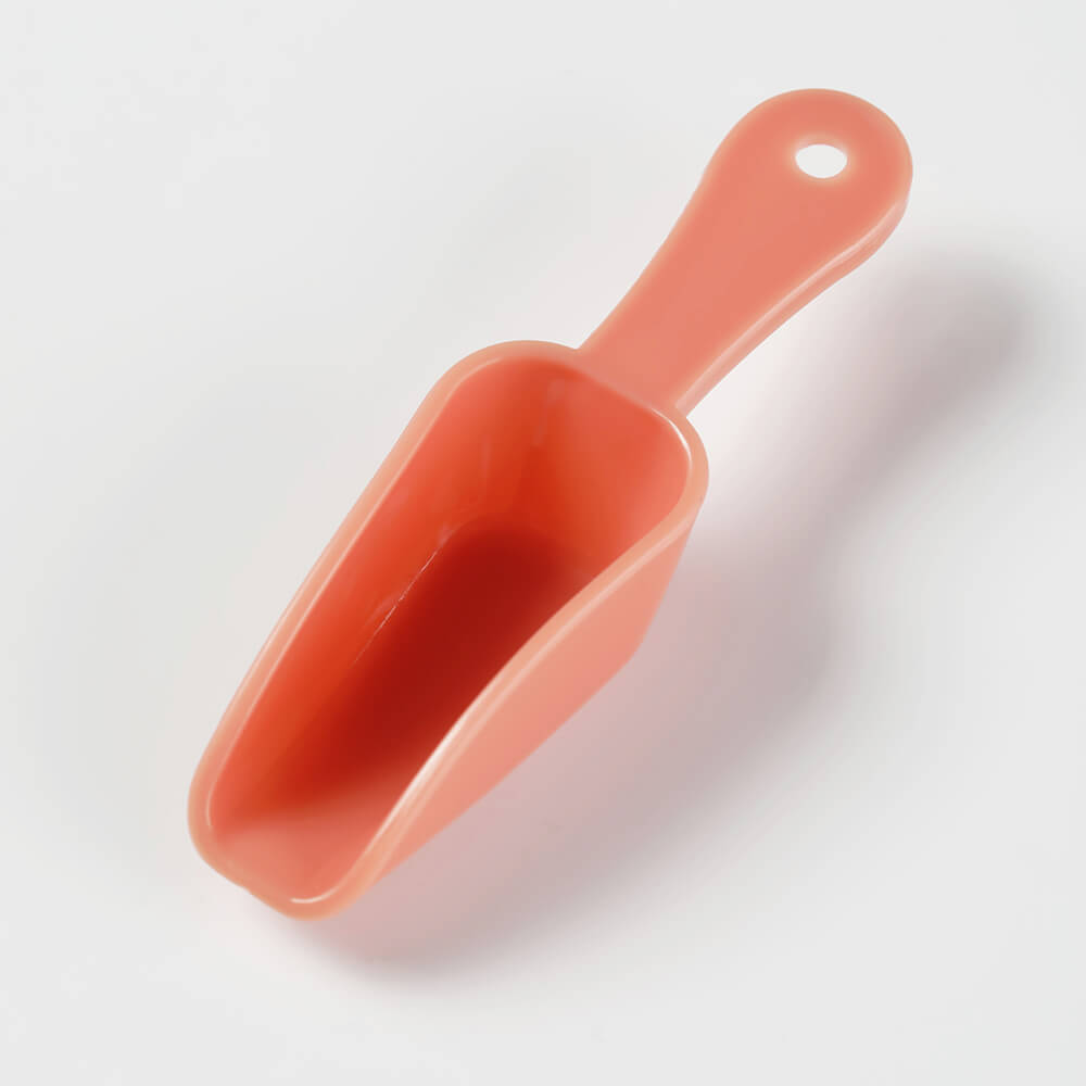 soil orange mini plastic spoon