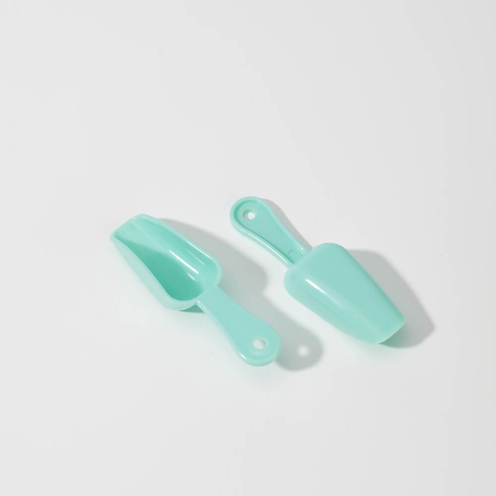 cyan plastic spoon