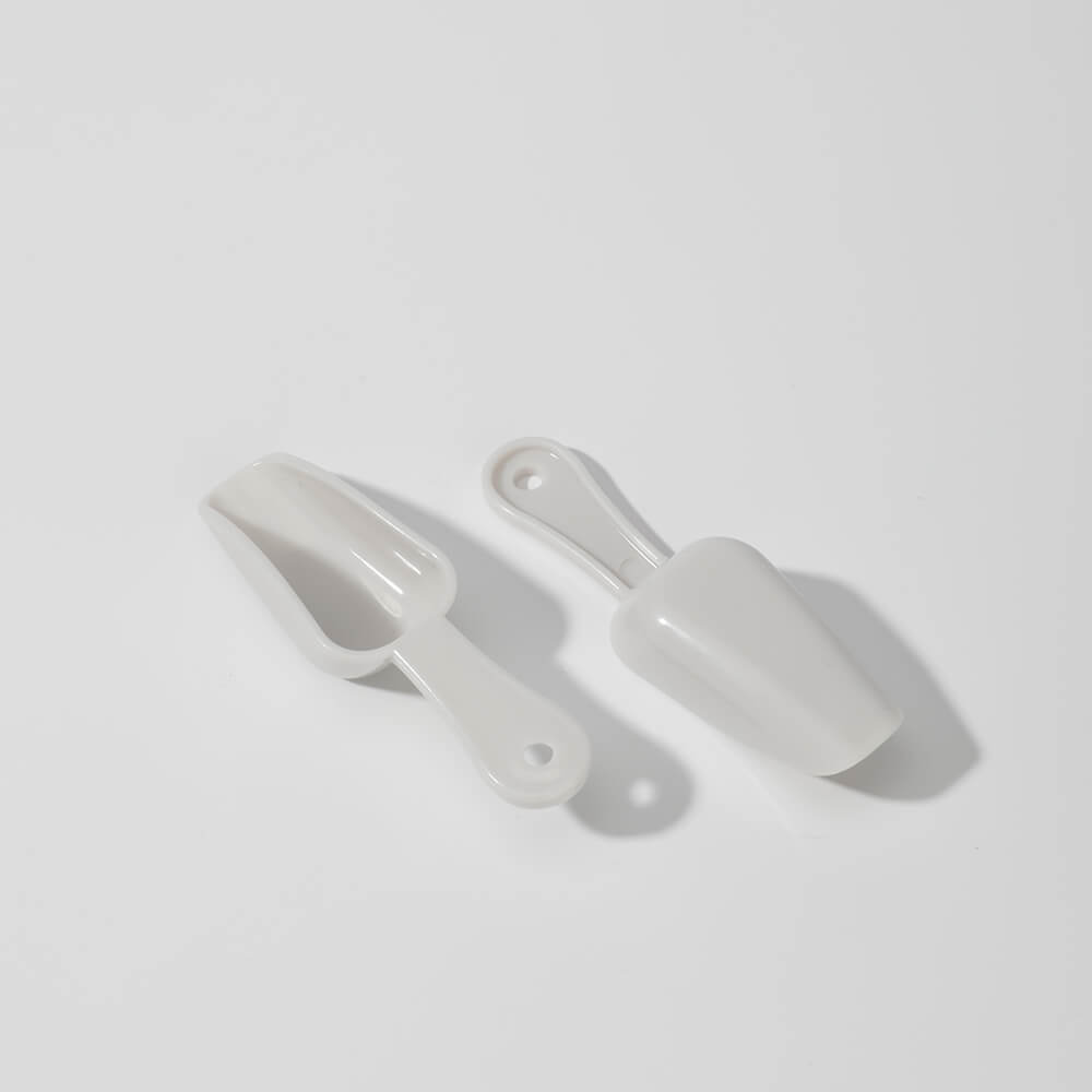 white mini plastic spoon