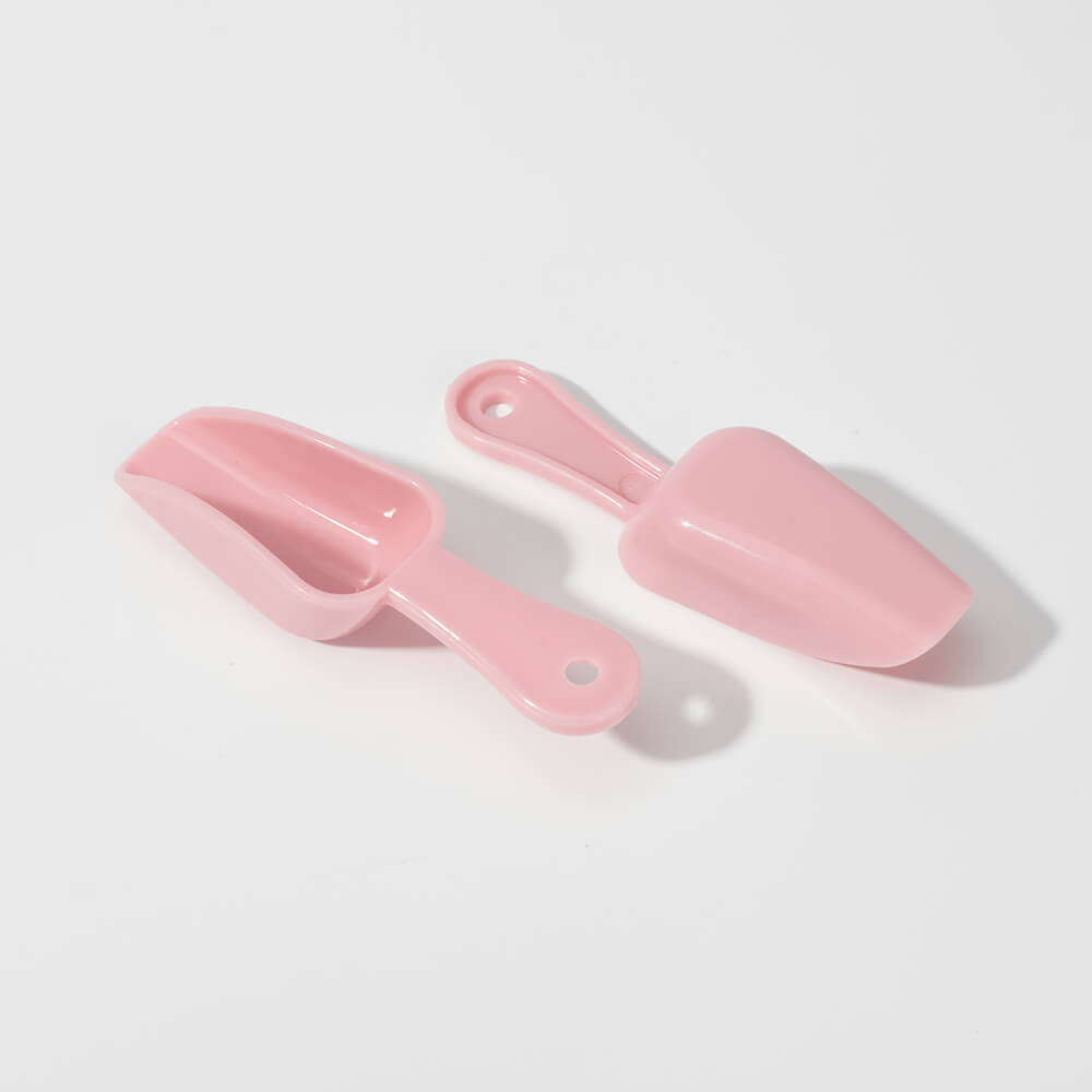 pink plastic spoon