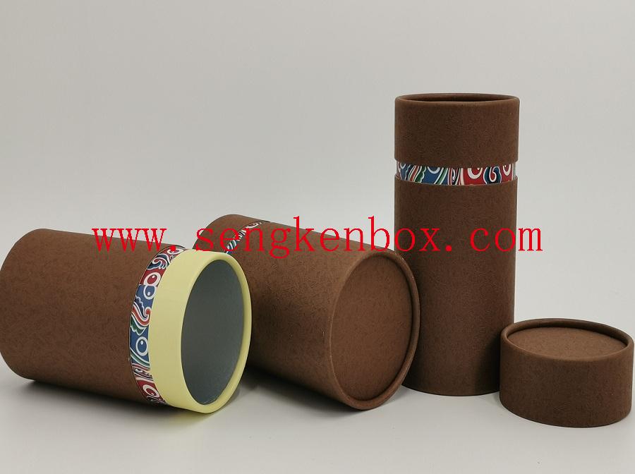 Brown Kraft Paper Canister with Yellow Neck for Tea Packaging Brown Kraft Paper Canister with Yellow Neck for Tea Packaging